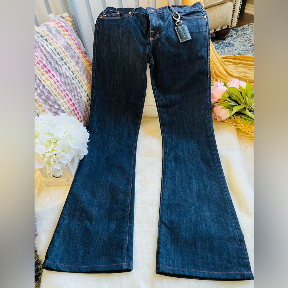 Designer Rock & Republic dark blue fitted top and flare bottom detailed jeans.